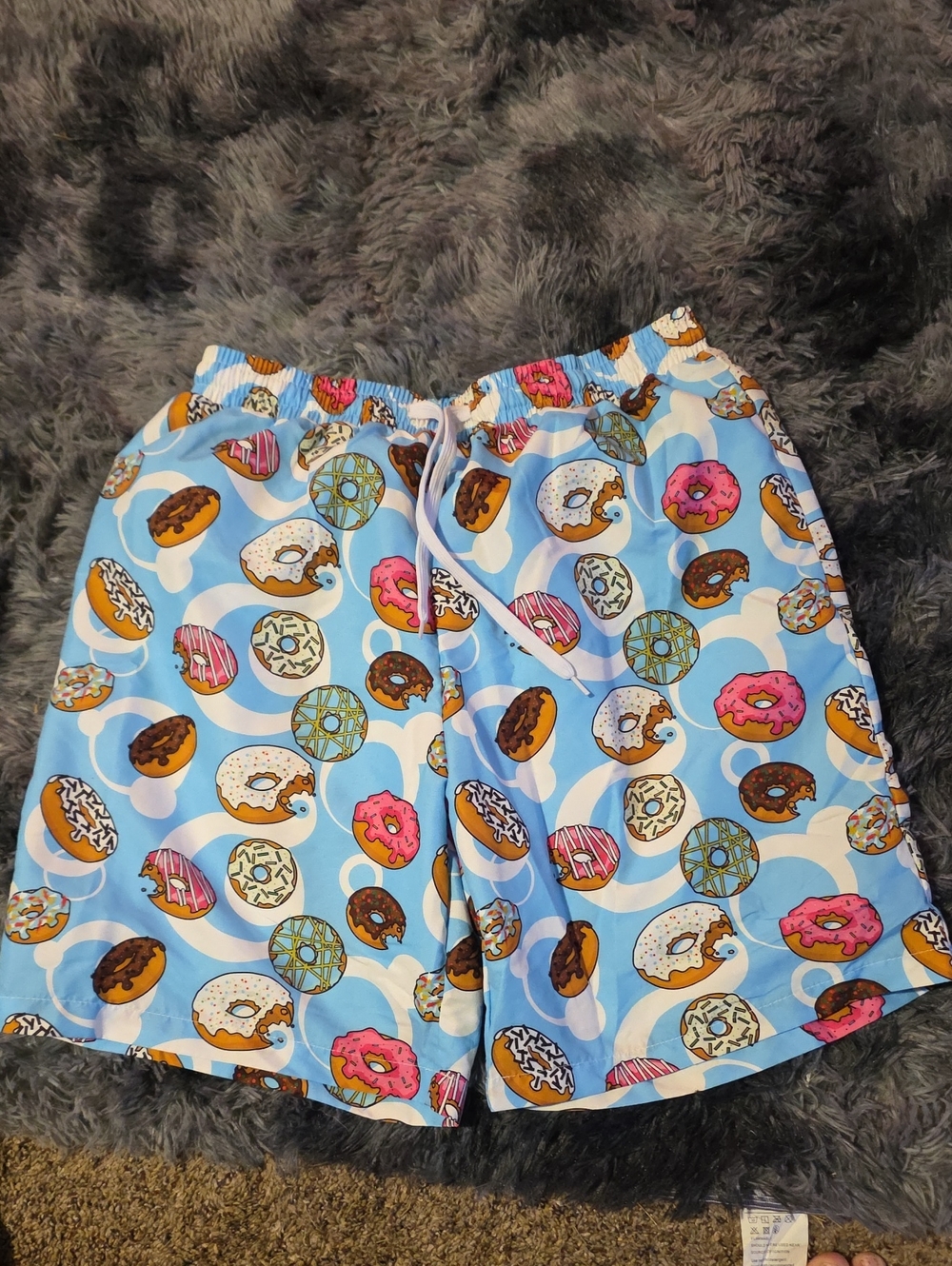 SHEIN Light Blue Donut Print Men’s Swim Trunks
